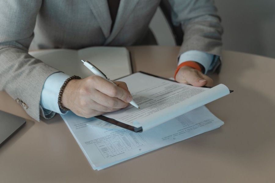 An application form filled in by hand